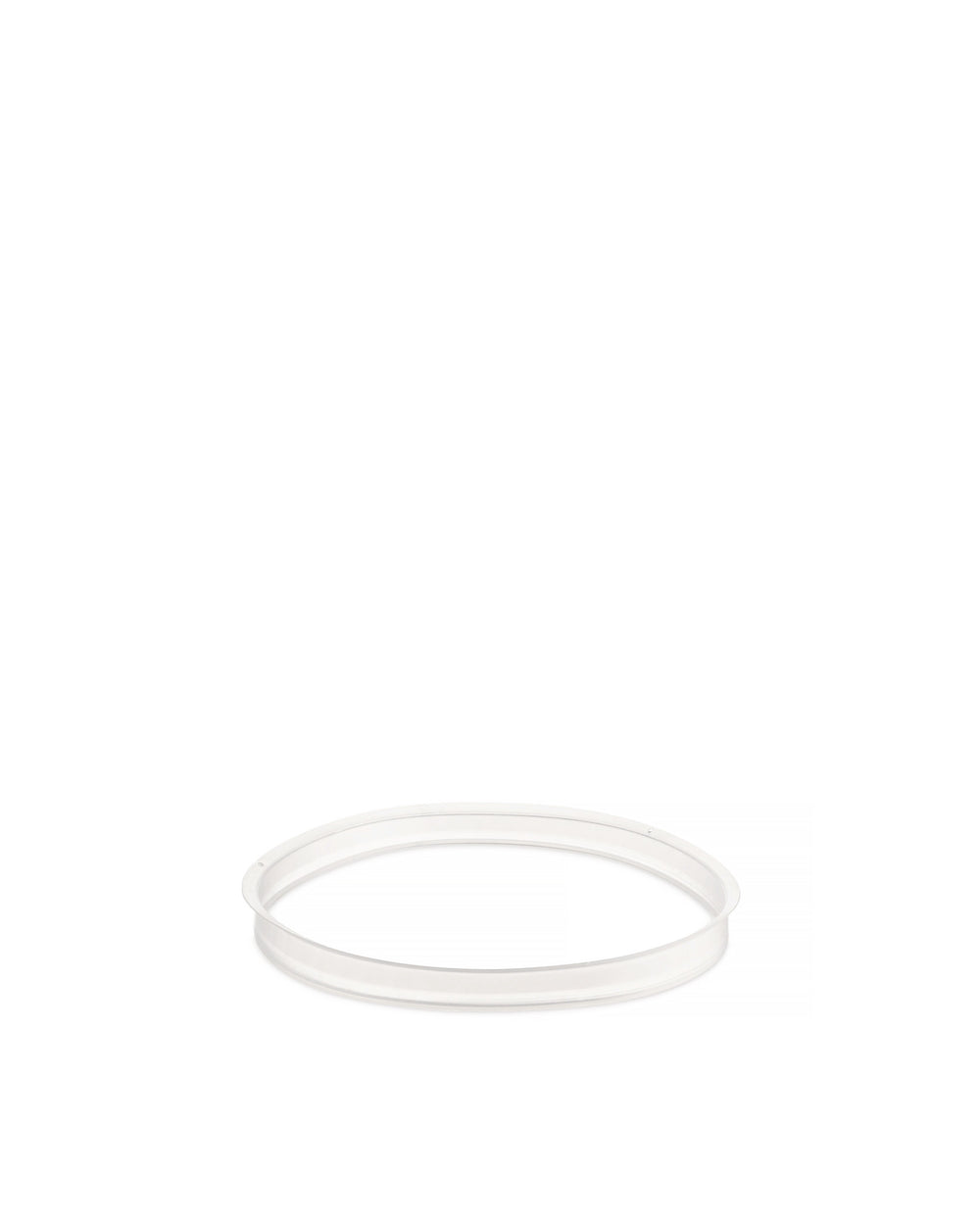 White translucent circular gasket by Alessi with a raised outer edge, isolated on a white background.