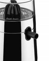 Chrome electric citrus juicer by Alessi with black reamer and clear lid, side view.