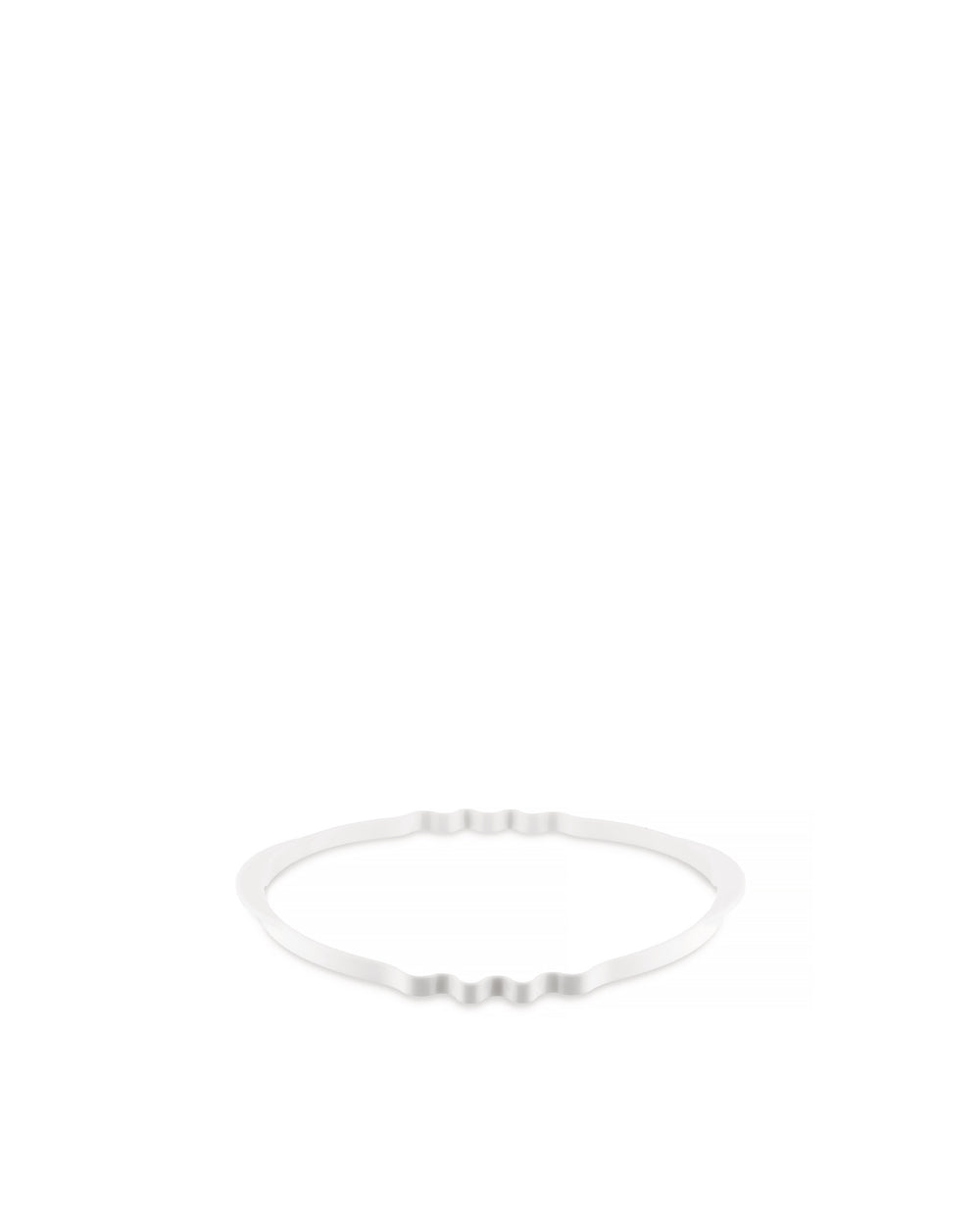 White ring spare part by Alessi, with wavy top and bottom edges, viewed at a slight angle.