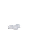 Four small, round, translucent plastic spare parts by Alessi, scattered, each with a central raised component.