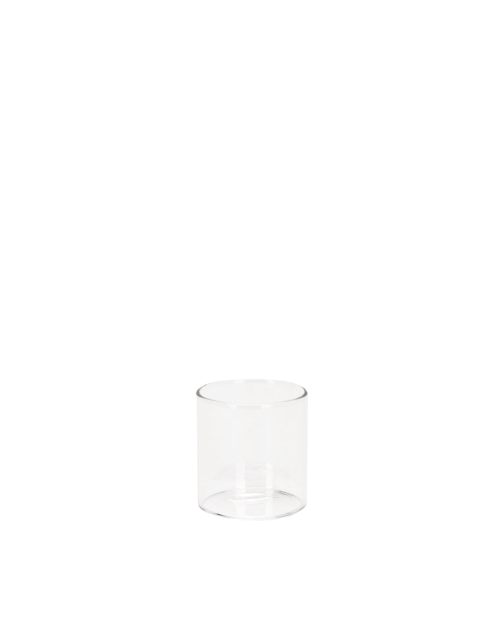 A clear cylindrical glass spare part by Alessi, standing upright on a white background.