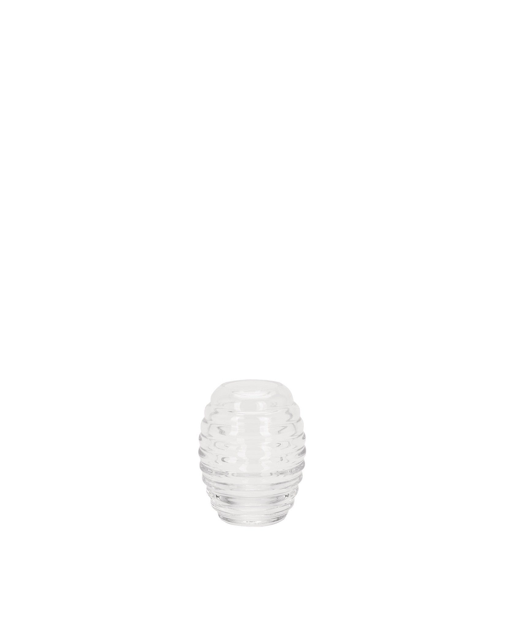 Clear ribbed spare part by Alessi, with a cylindrical, beehive-like design.