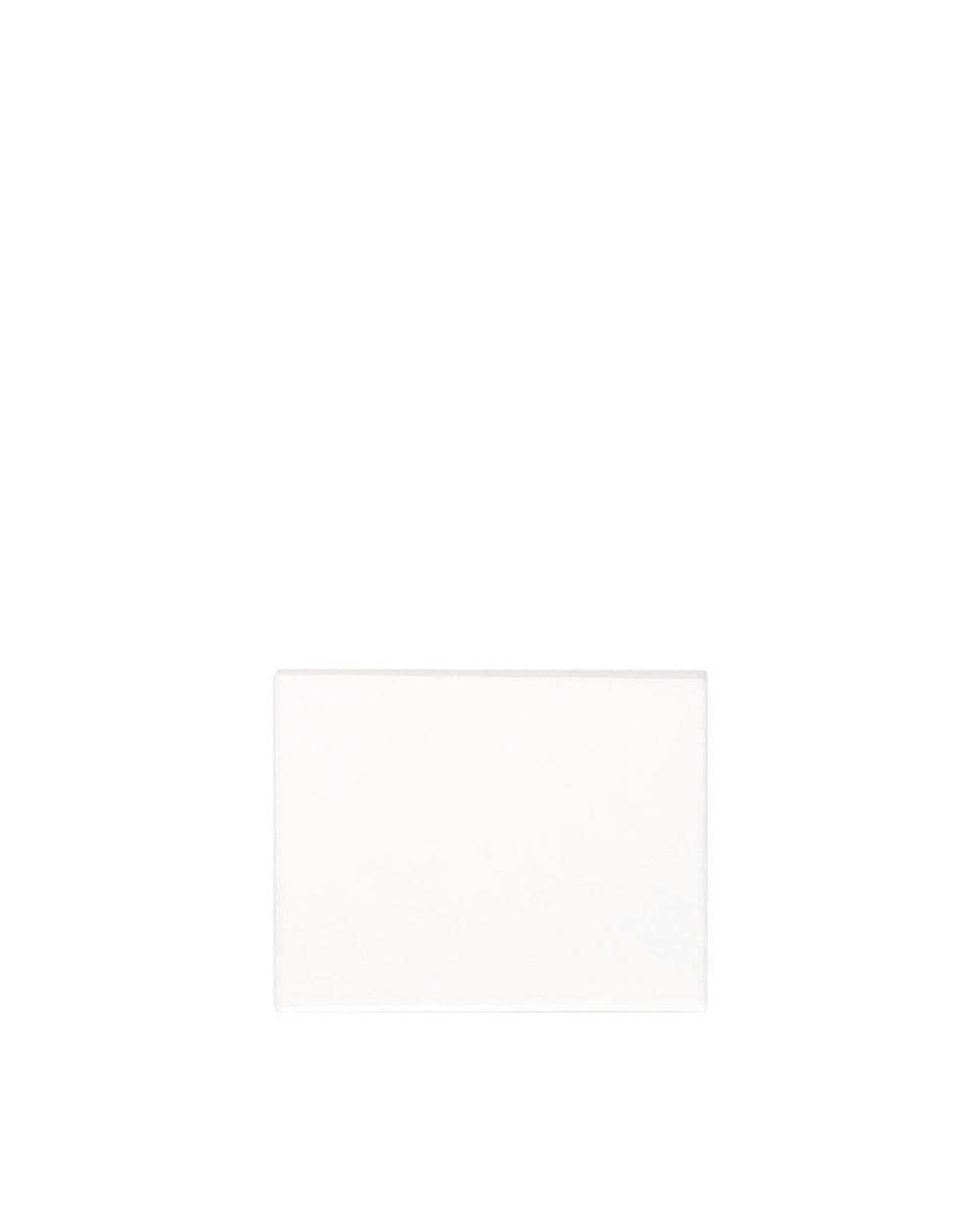 White rectangular spare part by Alessi with a smooth, matte finish and subtle rounded edges.