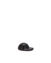 Black cap-shaped spare part by Alessi, with a matte finish and a small hole on top.