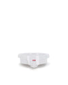 White juicer collection basin by Alessi, with a clear spout and red 'Alessi Juicer' text.